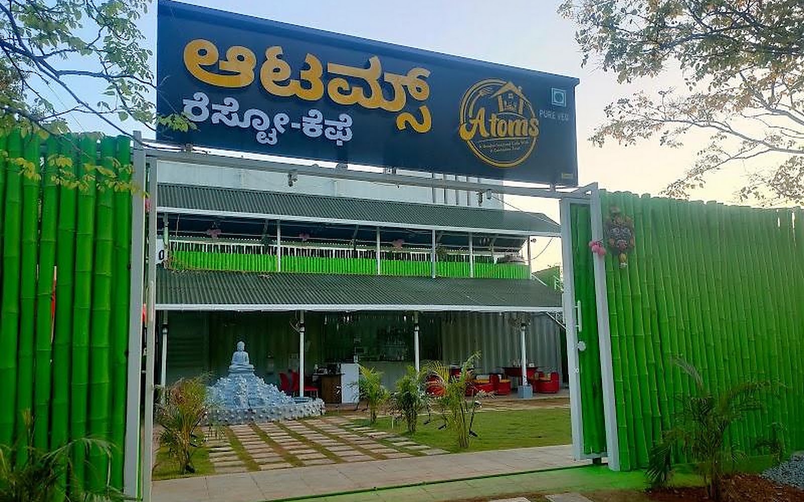 atoms resto cafe Davangere visiting card