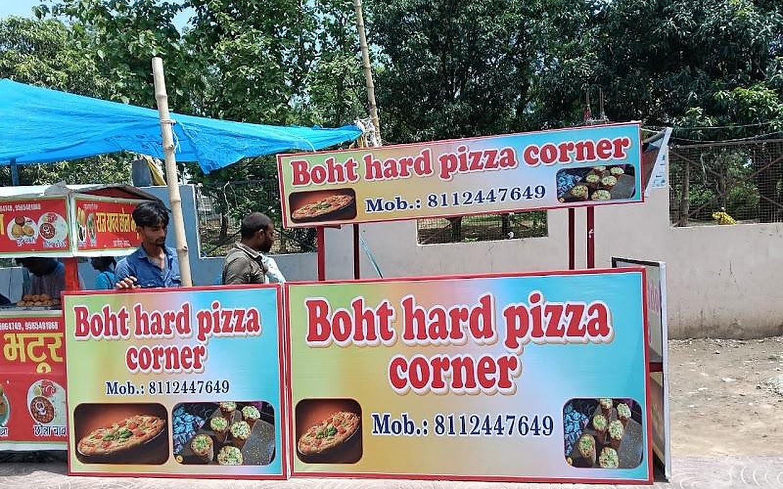 Boht hard pizza corner Faizabad visiting card