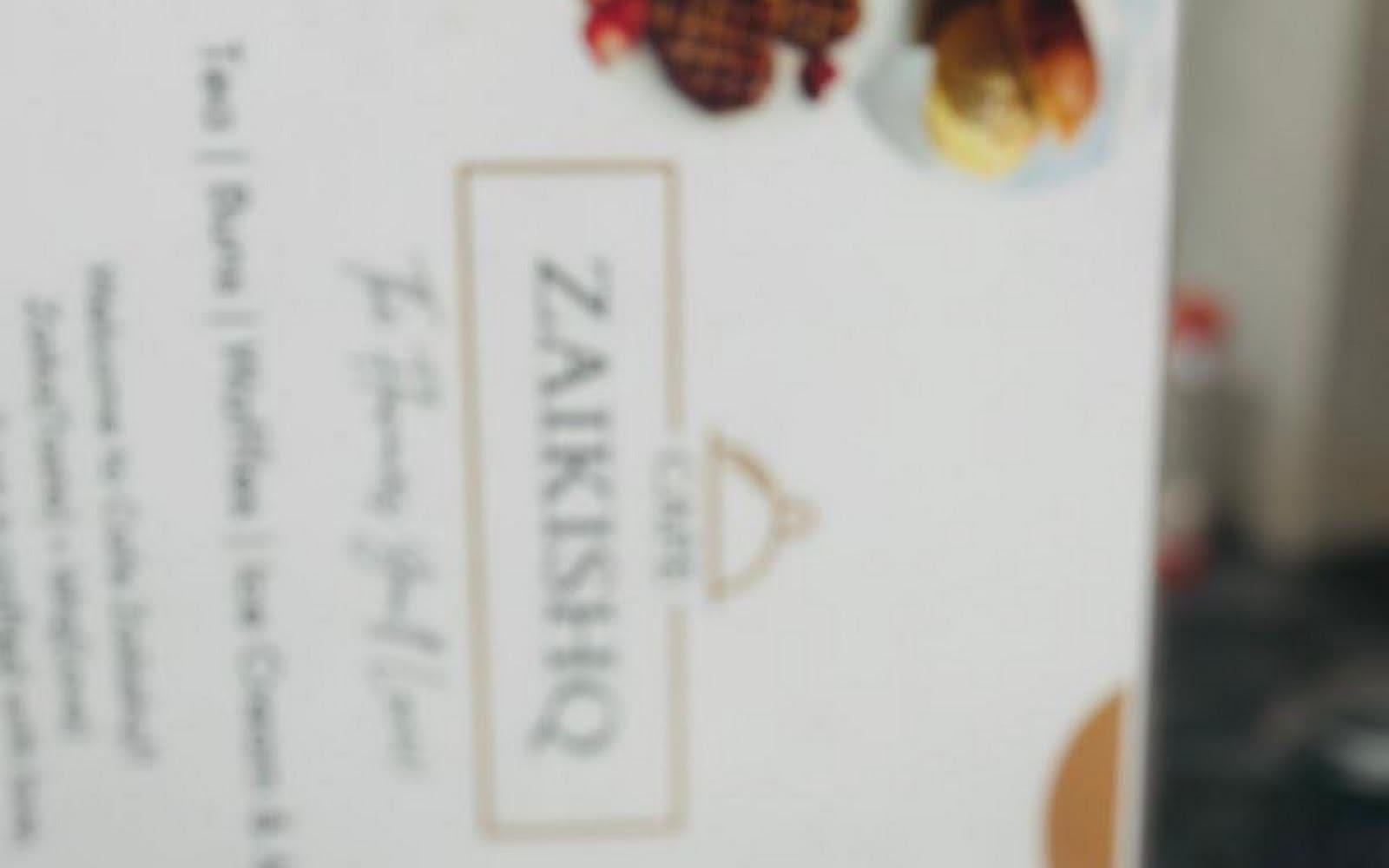 Cafe Zaikishq Davangere visiting card