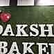 Daksh Beakers visiting card