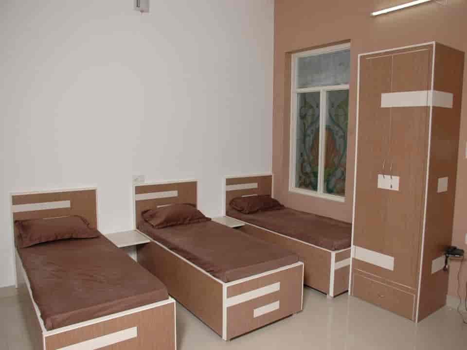 Krish Girls Hostel visiting card