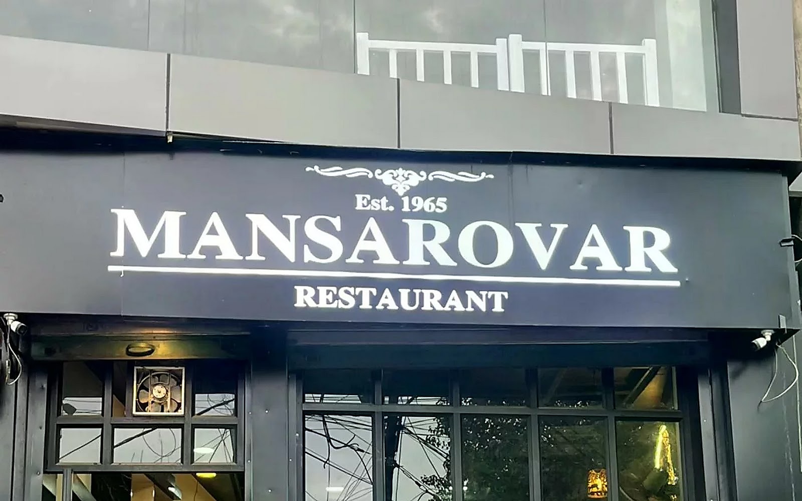 Mansarovar Restaurant Almora visiting card