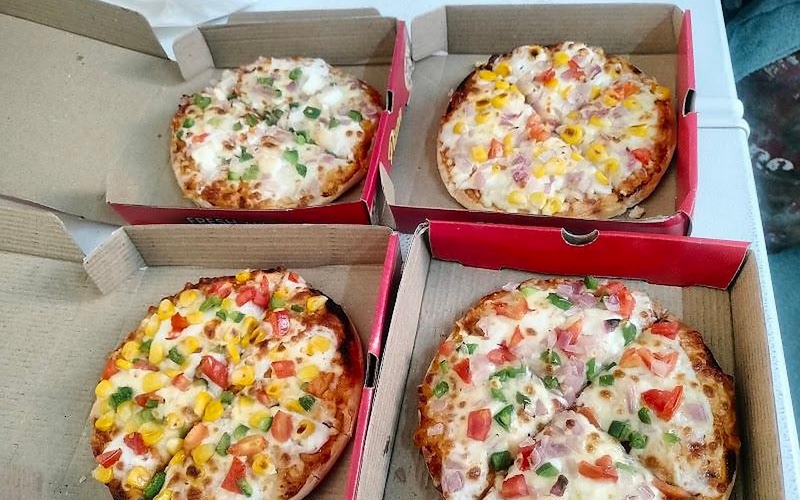 PksmPizza and cakes Bhiwadi visiting card