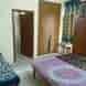 Radhika Hostel visiting card
