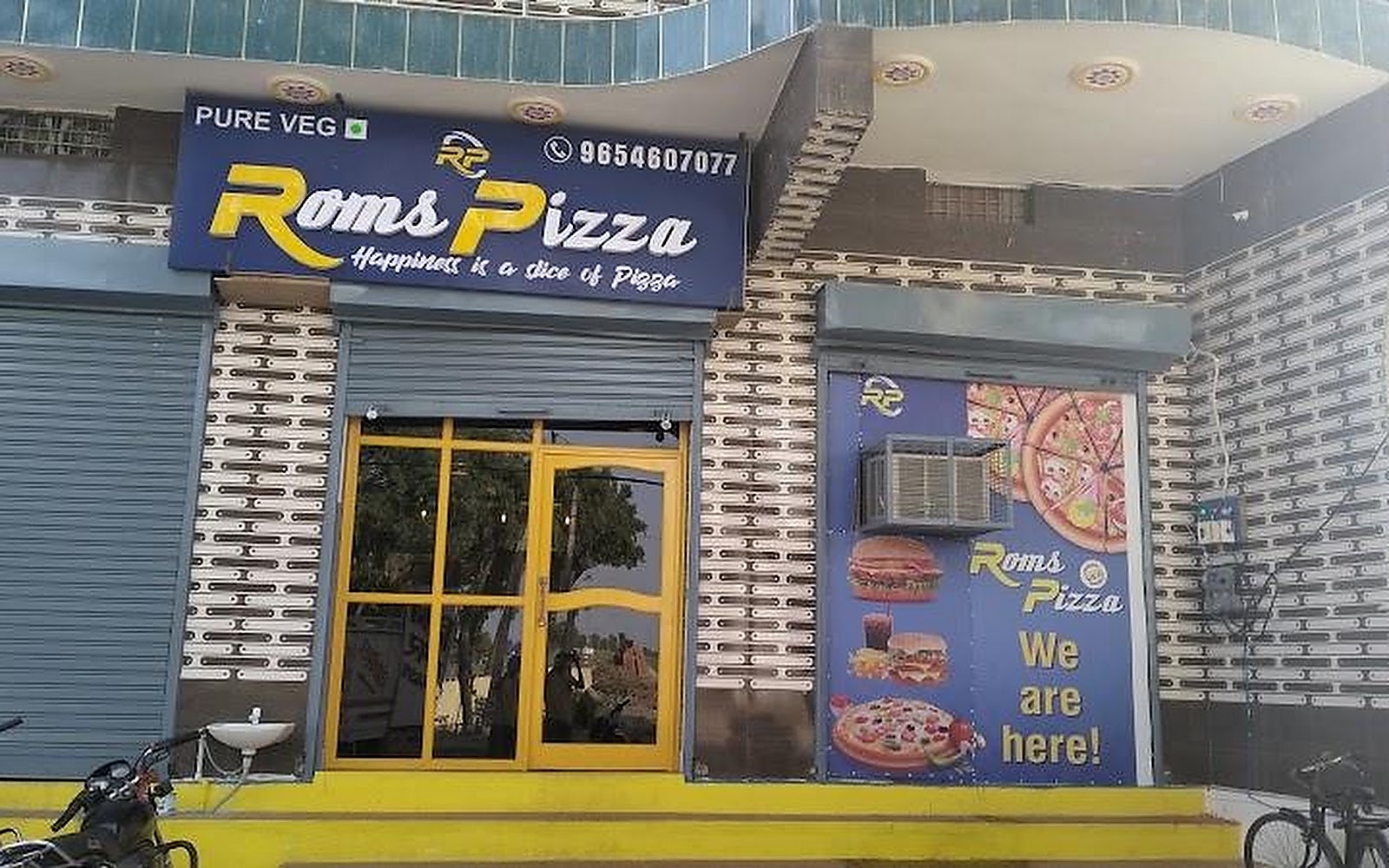 Roms Pizza Chhaprauli Baghpat visiting card