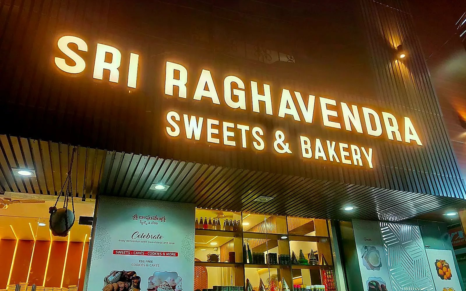 Sri Raghavendra Sweets and Bakery Guntur visiting card