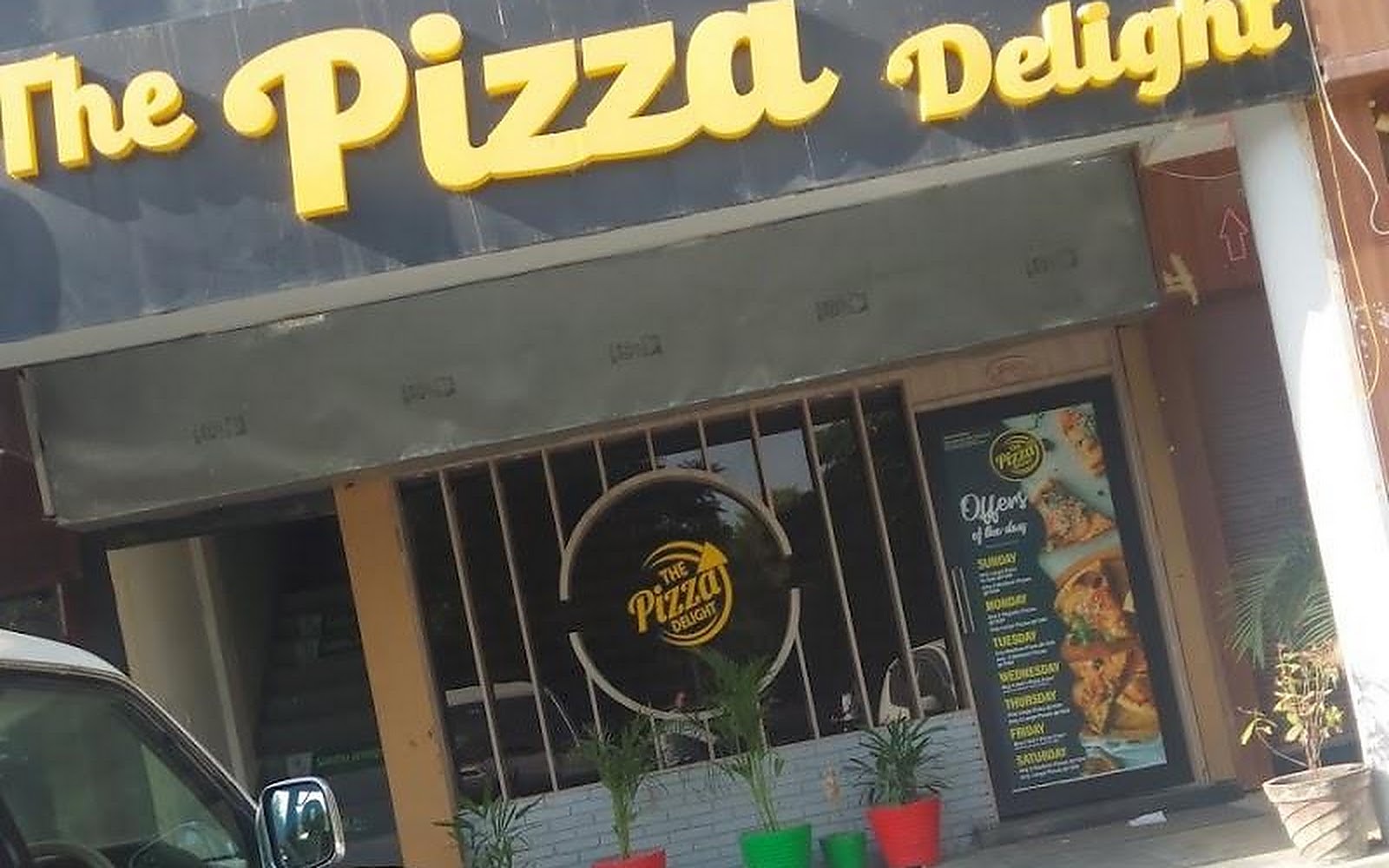The Pizza Delight Faridkot visiting card