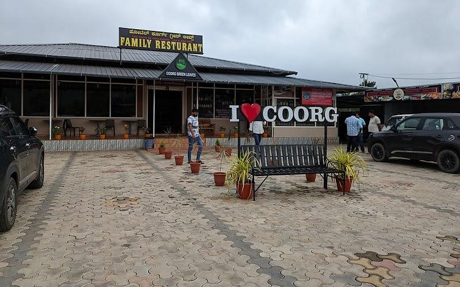 The Taste of Thalassery Family Restaurant Coorg visiting card