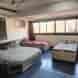 Urban Escape Hostel and PG Inn Surat visiting card