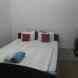 Wow Rooms Homestays visiting card